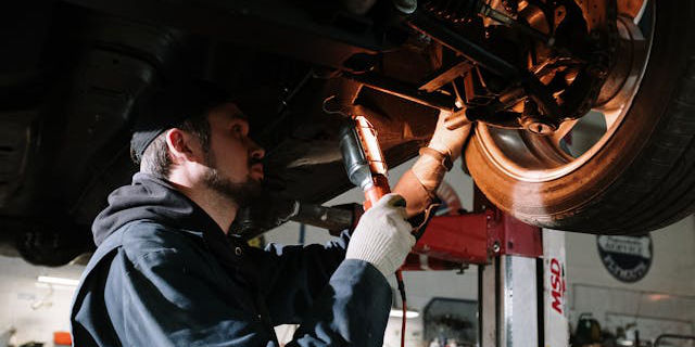 Mechanic fixing engine